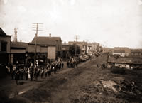 A  parade on Mainstreet shows some of its oldest buildings